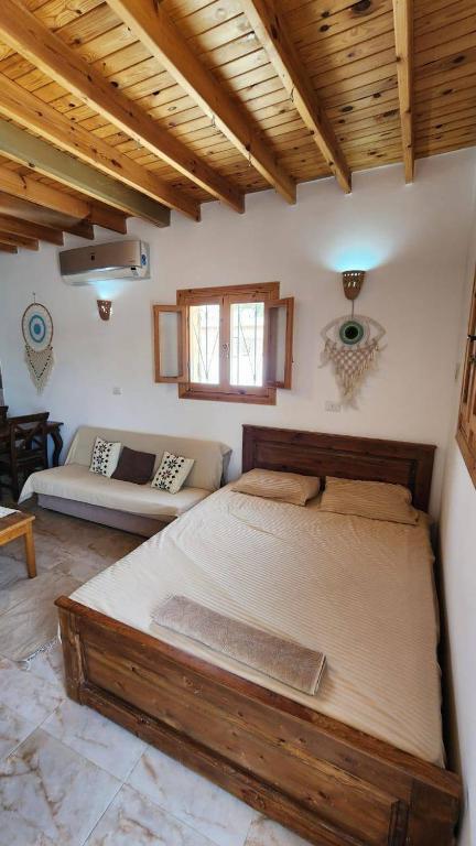 Postel nebo postele na pokoji v ubytování Villa Vovan