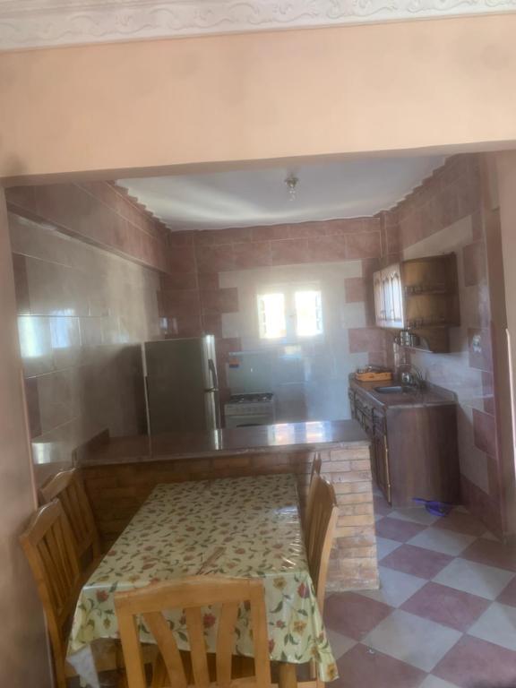 Kuchyň nebo kuchyňský kout v ubytování Burj al Huda