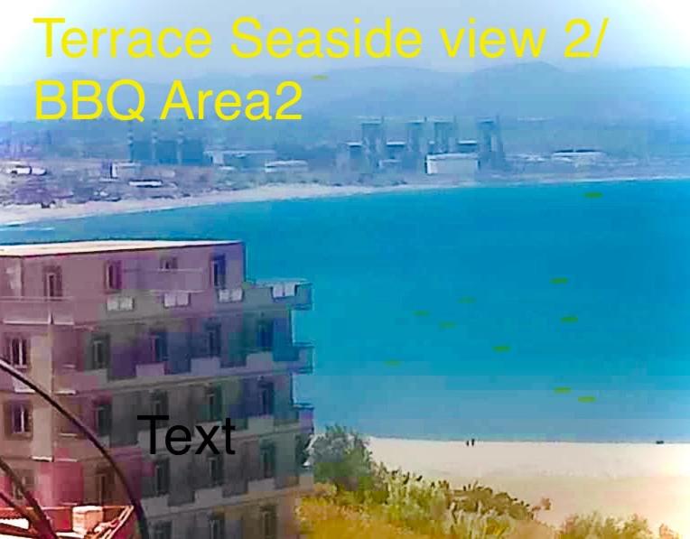 a picture of a building next to the water at Beach Town flat1 in Mazer