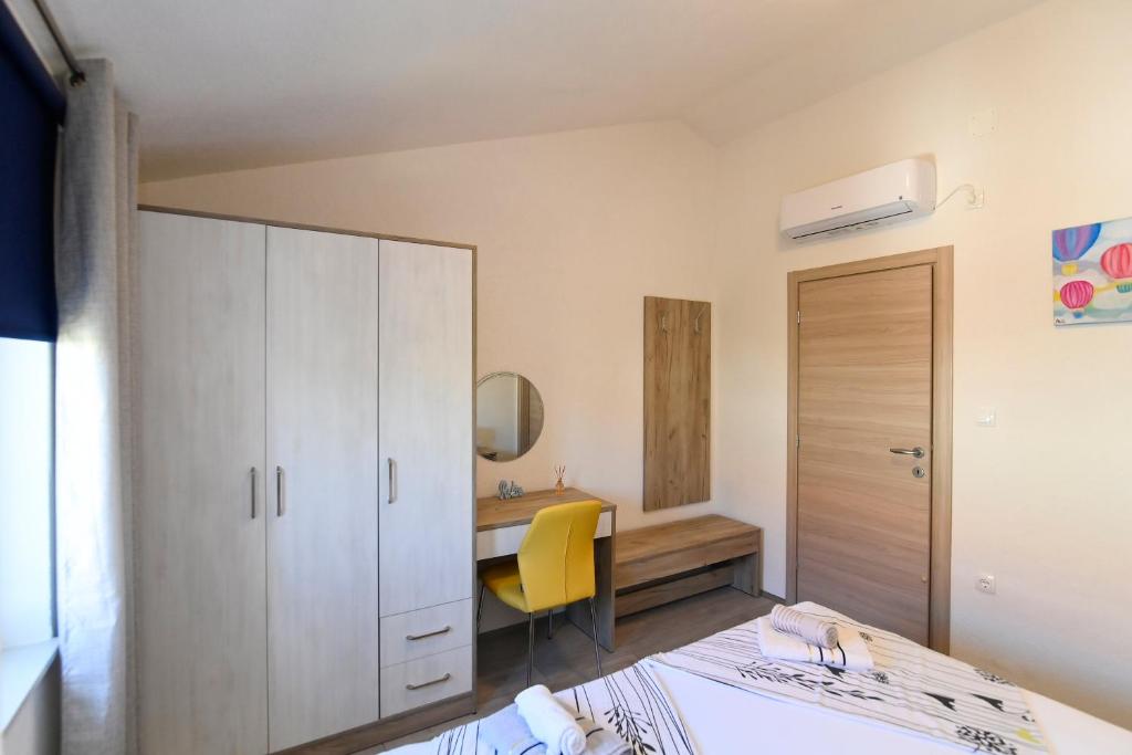 Postel nebo postele na pokoji v ubytování Vacation house Ulika