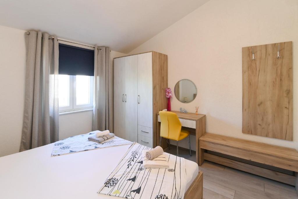 Postel nebo postele na pokoji v ubytování Vacation house Ulika