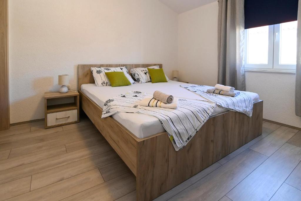 Postel nebo postele na pokoji v ubytování Vacation house Ulika