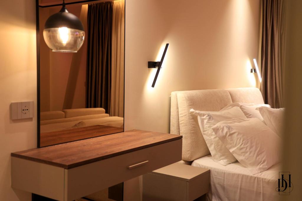 Postel nebo postele na pokoji v ubytování DeHa Rooms & Apartments