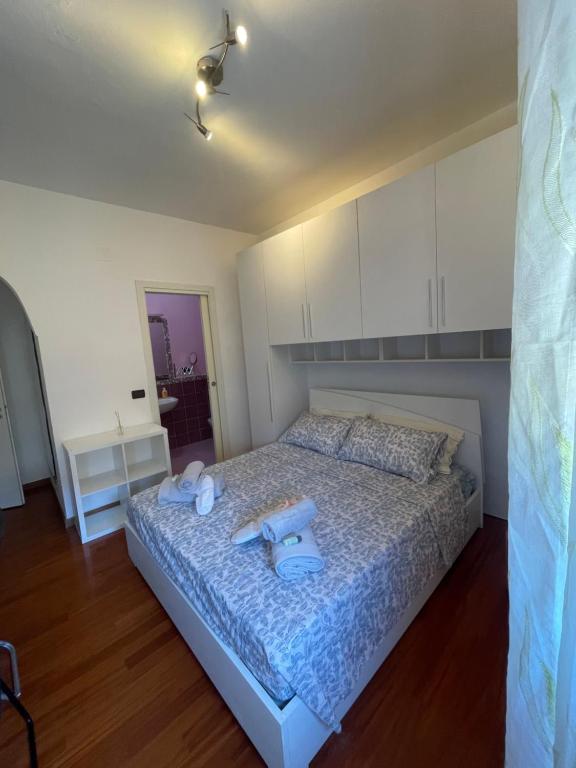 Postel nebo postele na pokoji v ubytování House tower Pisa
