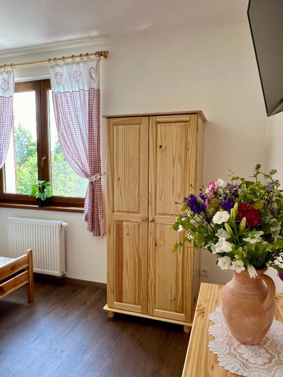 TV a/nebo společenská místnost v ubytování Chalupa nad rybníkem