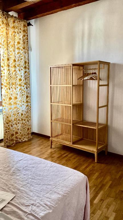Postel nebo postele na pokoji v ubytování Nel Cuore di Volta Mantovana