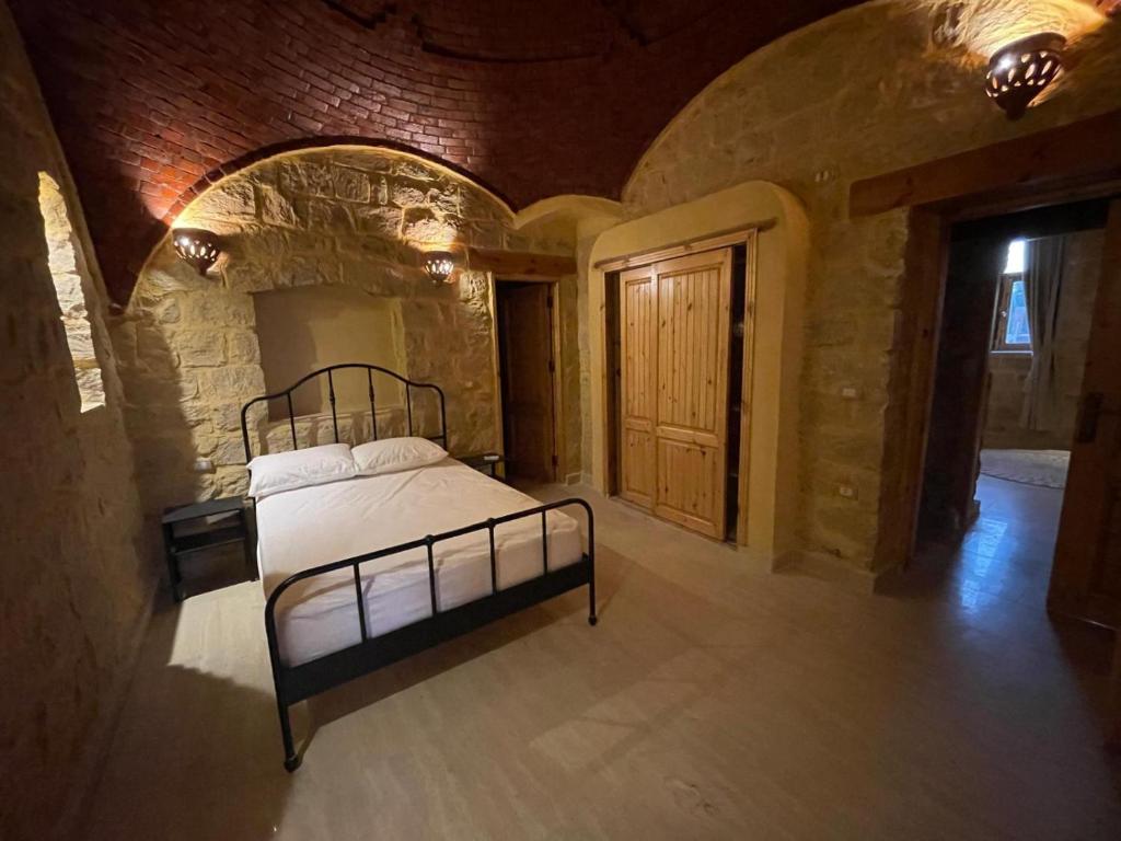Postel nebo postele na pokoji v ubytování Hoopoe lodge