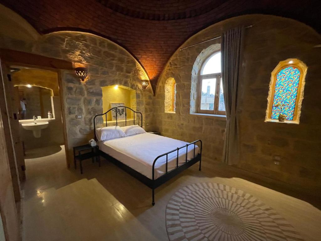 Postel nebo postele na pokoji v ubytování Hoopoe lodge