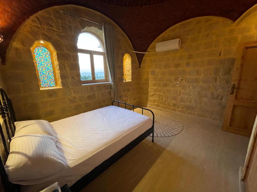 Postel nebo postele na pokoji v ubytování Hoopoe lodge