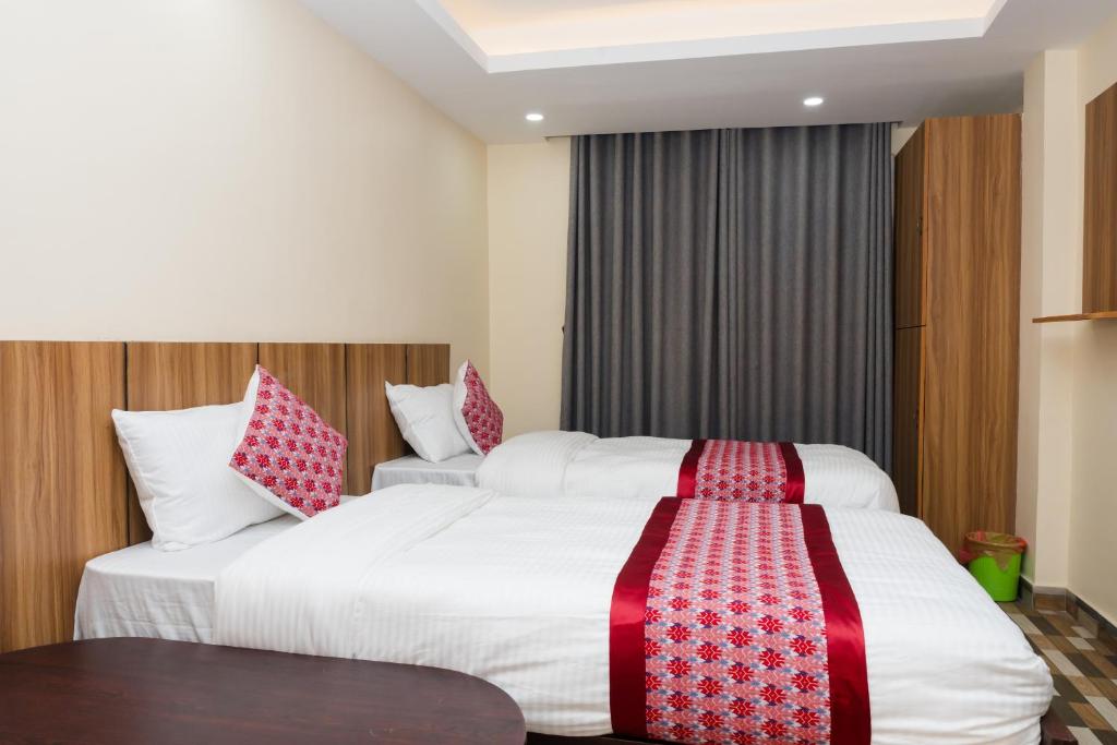 Postel nebo postele na pokoji v ubytování Rightway Hotel & Restaurant