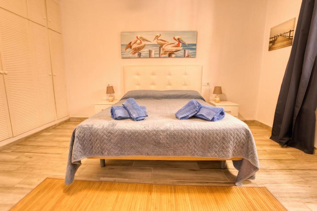 Posteľ alebo postele v izbe v ubytovaní Appartamento con 1 camera da letto con vista OV223