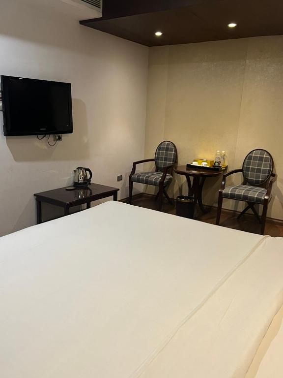 TV a/nebo společenská místnost v ubytování Skylark Boutique Hotel
