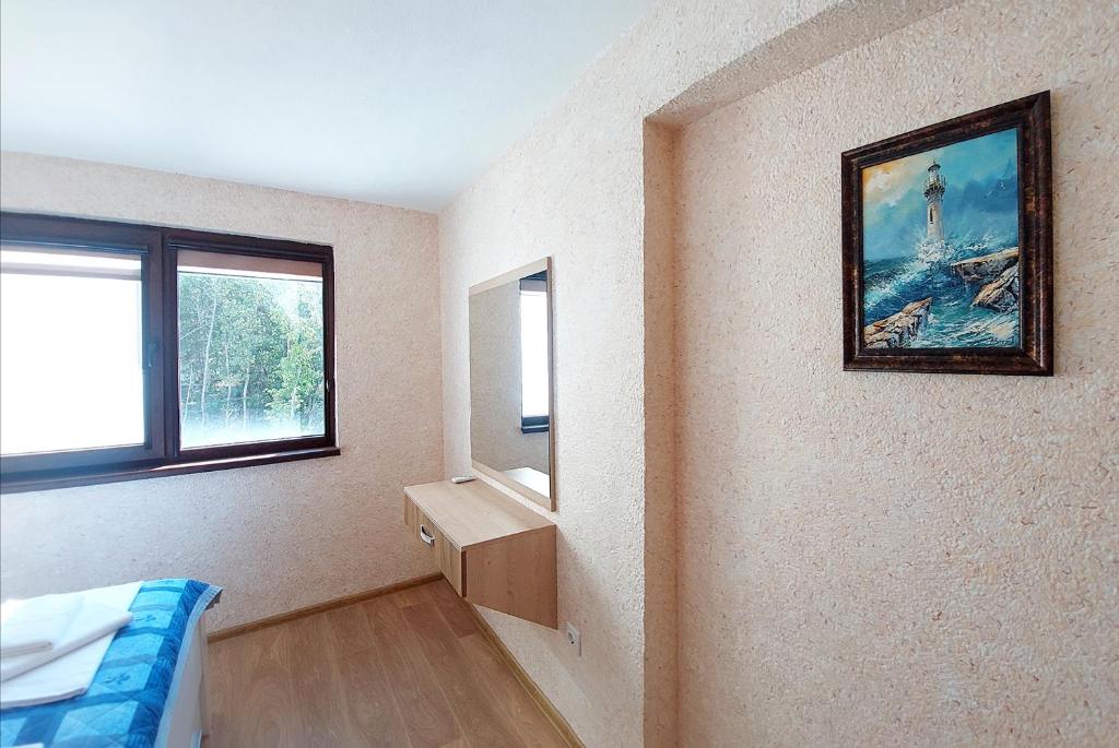Postel nebo postele na pokoji v ubytování Forest View Apartment