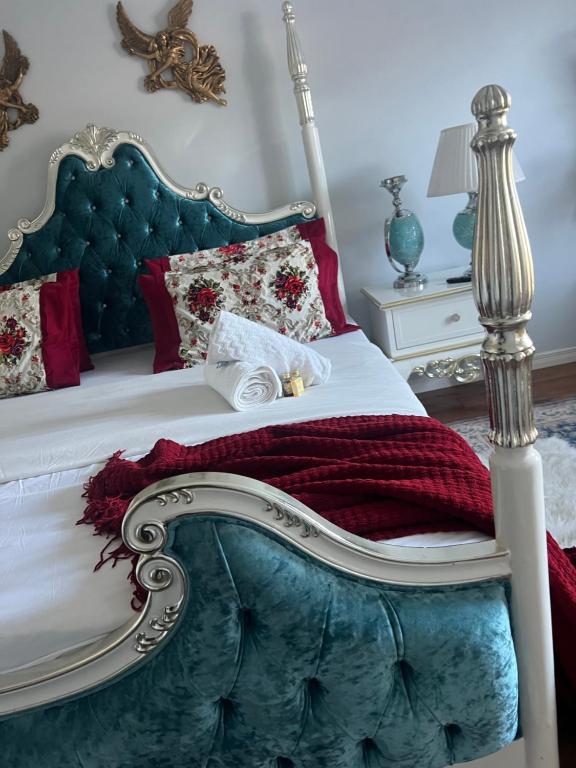 Katil atau katil-katil dalam bilik di Queen’s Gate Ecstasy Home