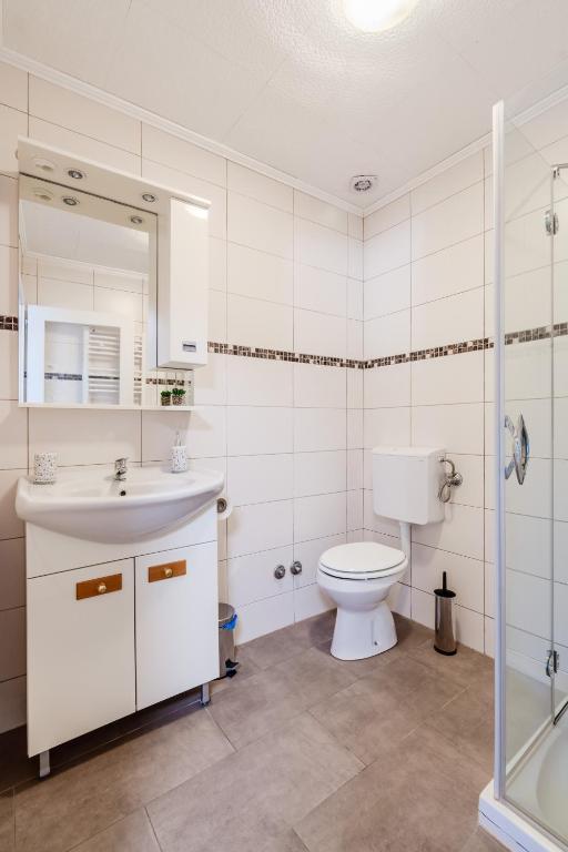 Kúpeľňa v ubytovaní Apartmaji Mouse