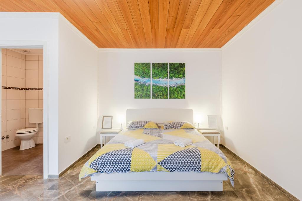 Posteľ alebo postele v izbe v ubytovaní Apartmaji Mouse