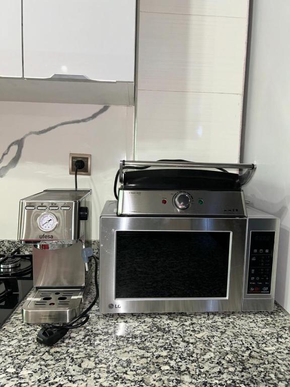 Una cocina o cocineta en Apartamento de lujo