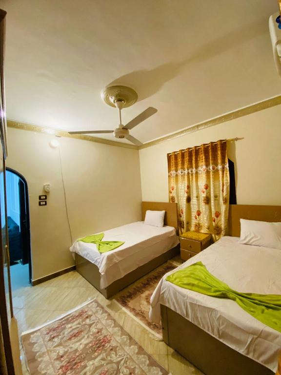 Postel nebo postele na pokoji v ubytování Basmatic2 Nubian Guest House