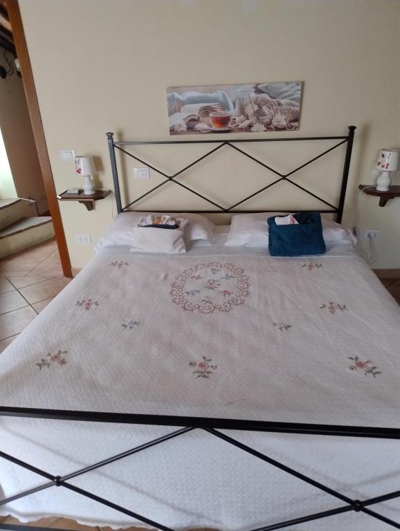 Postel nebo postele na pokoji v ubytování LA STREGA UBRIACA