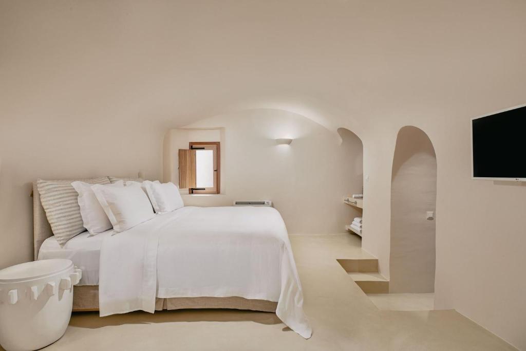 Łóżko lub łóżka w pokoju w obiekcie The Mill Haven Santorini