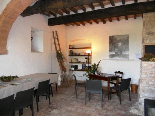 A seating area at Gli Appartamenti Di Torre Bertona