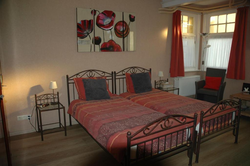 Een bed of bedden in een kamer bij B&B Le Maquis