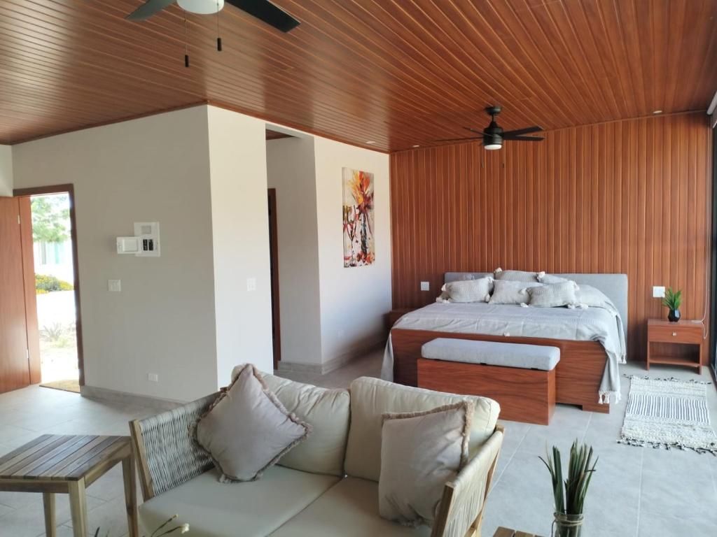 Ένα ή περισσότερα κρεβάτια σε δωμάτιο στο Quinta Lorame Departamento Cabernet