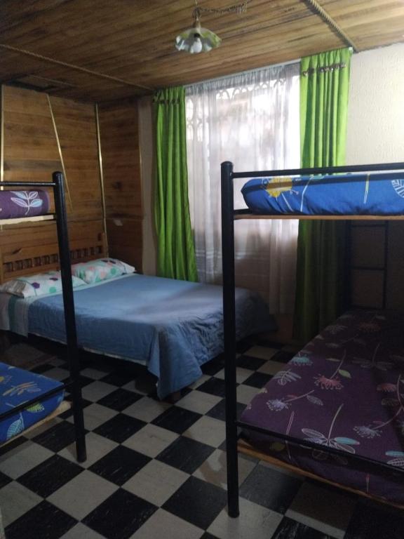 Postel nebo postele na pokoji v ubytování TCH Capsule Home