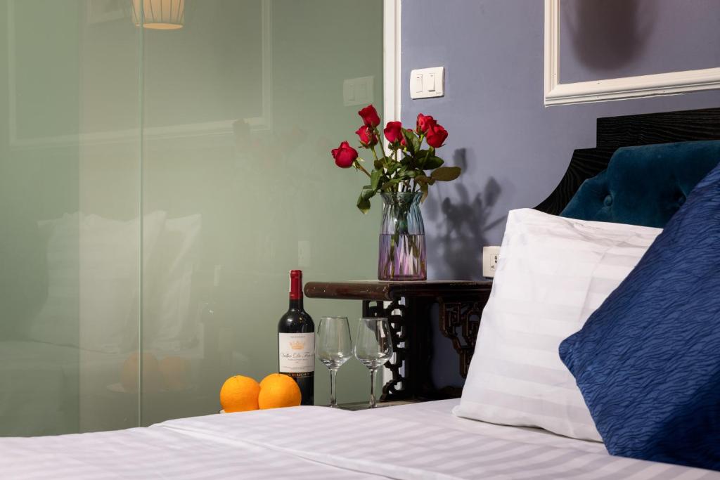 Postel nebo postele na pokoji v ubytování Amanda Boutique Hotel & Travel