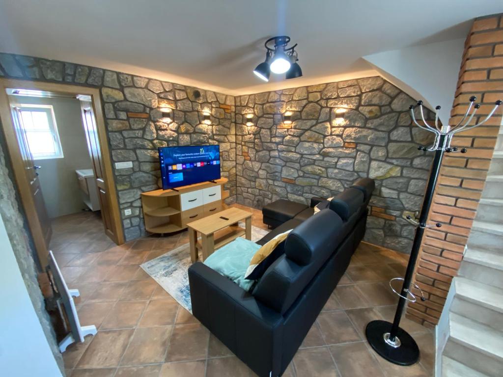 TV a/nebo společenská místnost v ubytování Vineyard Cottage Joanna