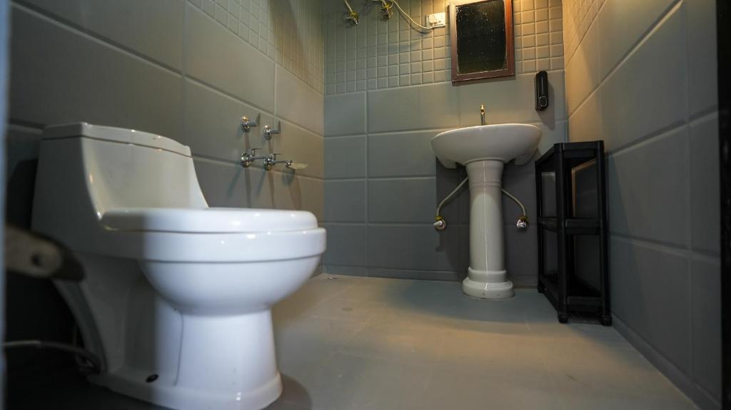 Koupelna v ubytování Sort By Stays, Kareri