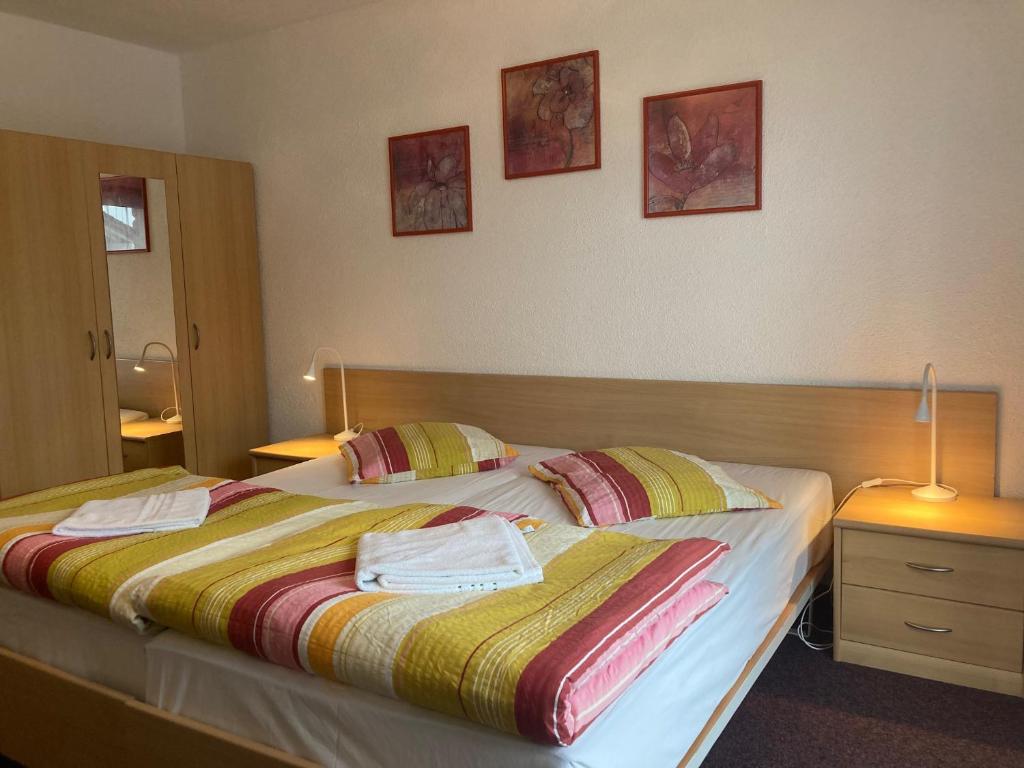 Postel nebo postele na pokoji v ubytování Hotel Waldhof