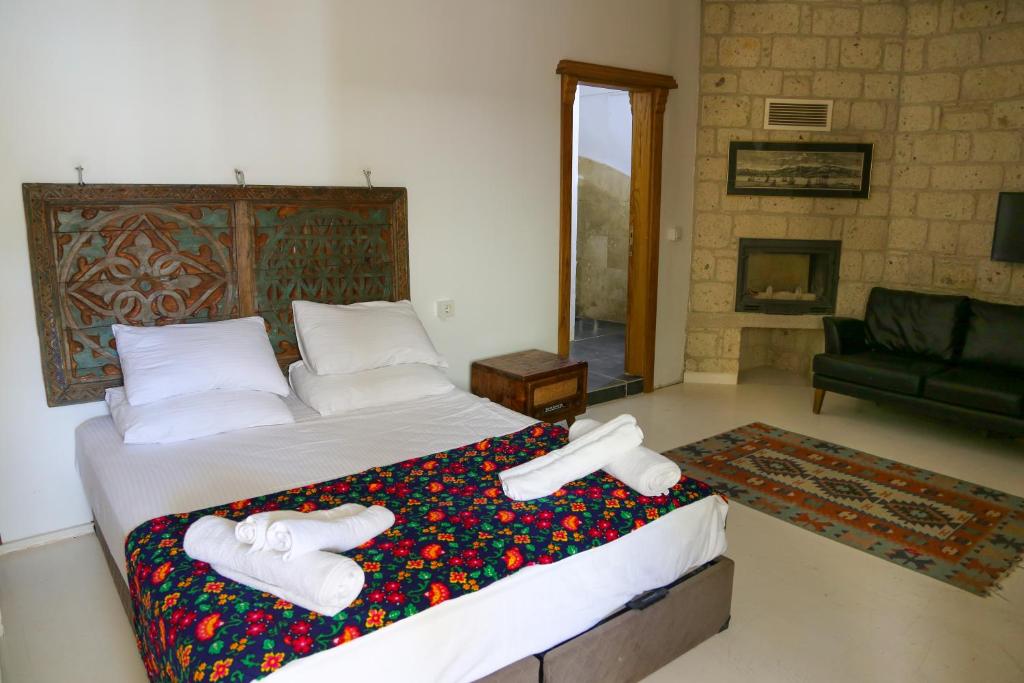Postel nebo postele na pokoji v ubytování Rikas Boutique Otel