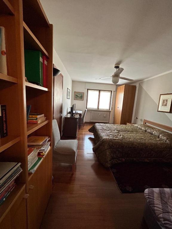 Postel nebo postele na pokoji v ubytování Mansarda di Charme a Verona