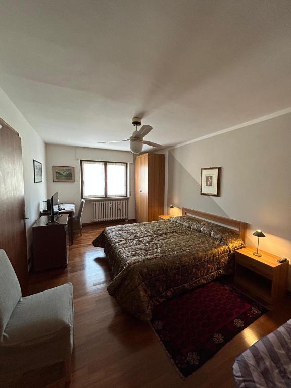 Postel nebo postele na pokoji v ubytování Mansarda di Charme a Verona