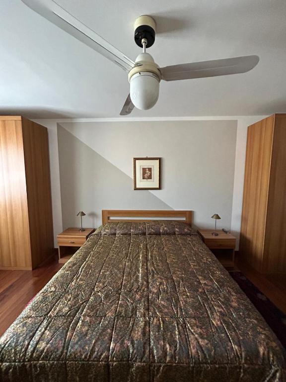 Postel nebo postele na pokoji v ubytování Mansarda di Charme a Verona