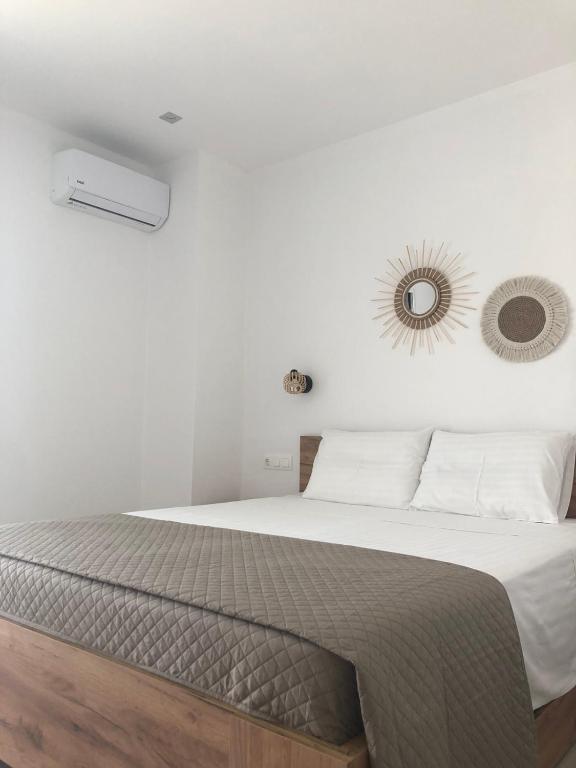 Postel nebo postele na pokoji v ubytování Fiosal Apartments 3