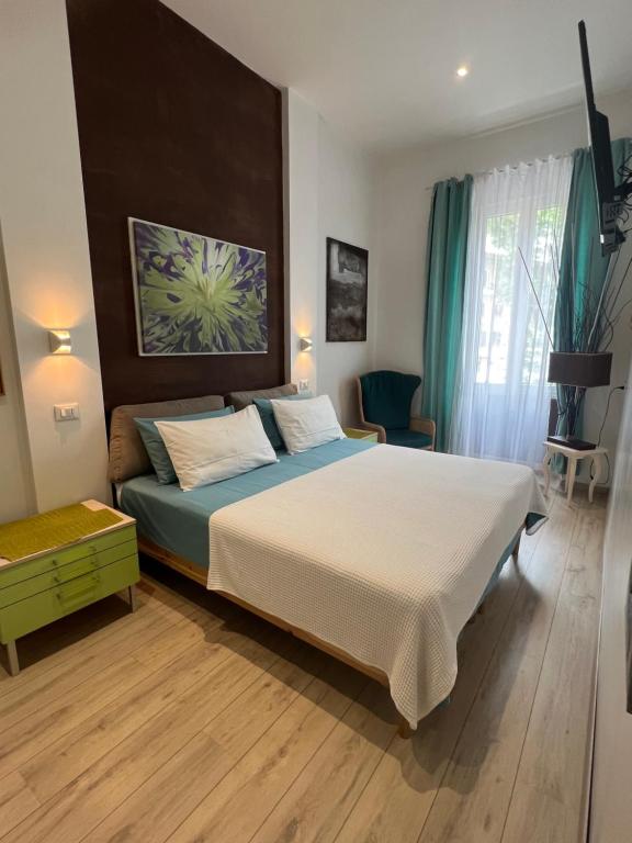 a bedroom with a large bed in a room at Correa Vatican Hospitality in Rome