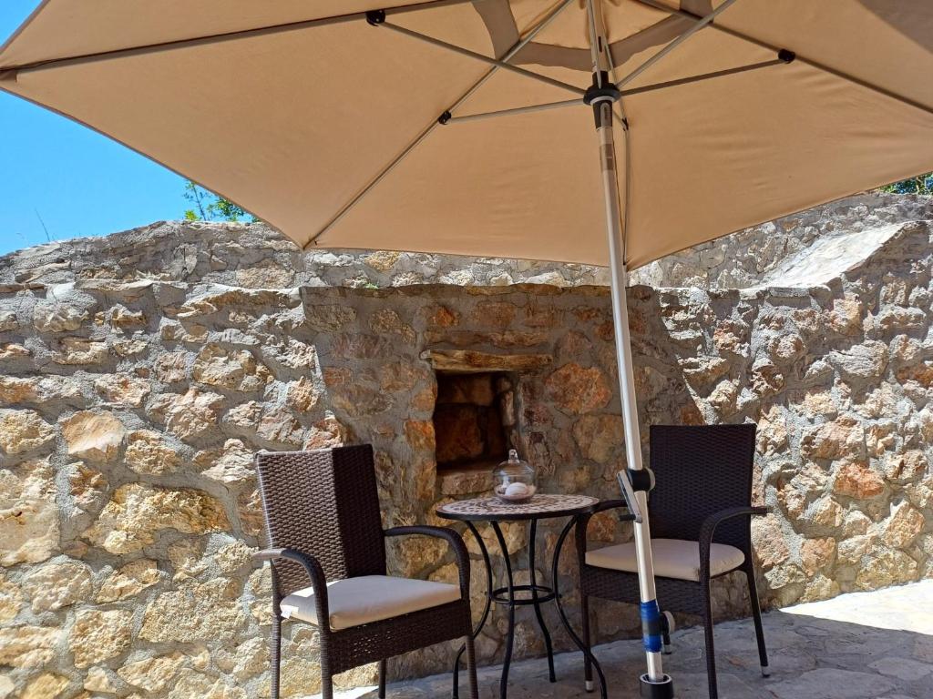 Patio alebo iná vonkajšia časť ubytovania Ambiente