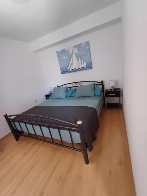 Posteľ alebo postele v izbe v ubytovaní Ambiente
