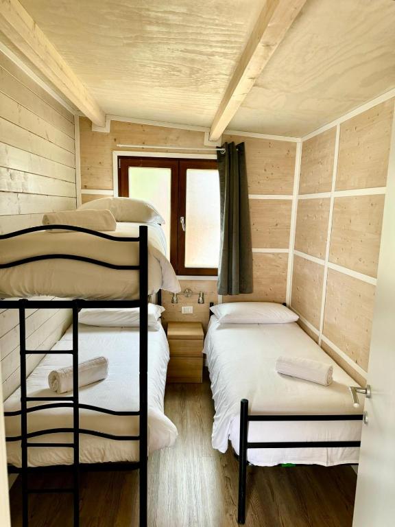Postelja oz. postelje v sobi nastanitve Monja Camping Village