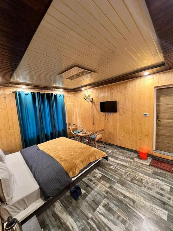 TV a/nebo společenská místnost v ubytování SONAMARG SNOW VIEW