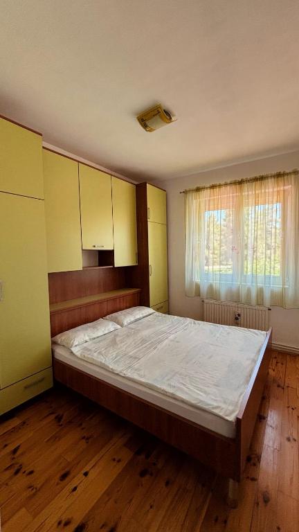 Postel nebo postele na pokoji v ubytování Stari grad