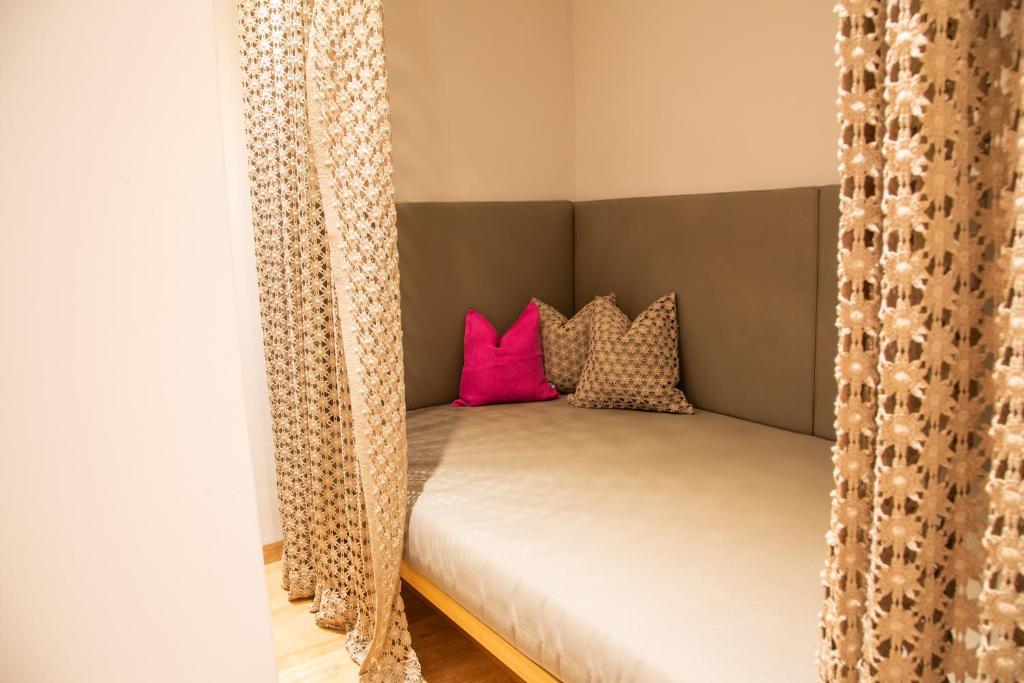 Postel nebo postele na pokoji v ubytování Hotel Alpenblick