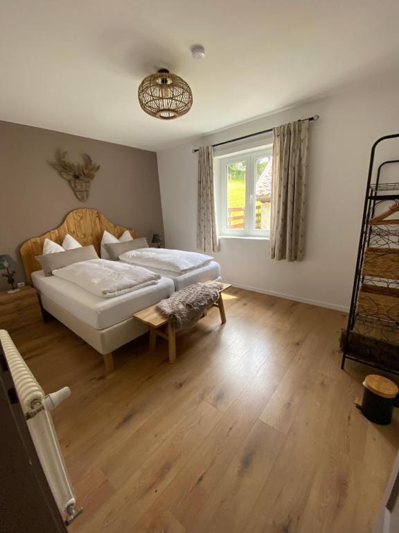 Postel nebo postele na pokoji v ubytování Haus Alpentraum