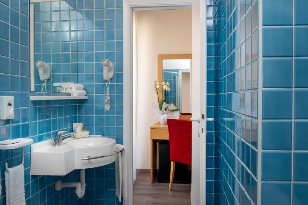 Koupelna v ubytování Hotel Cristina Corona