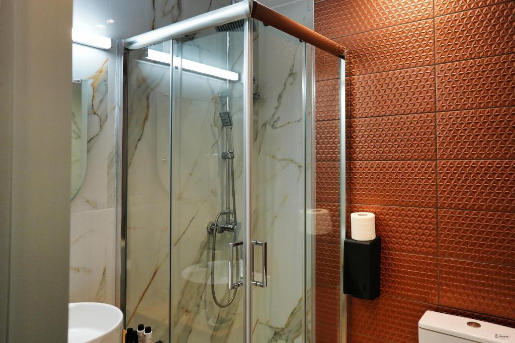 Koupelna v ubytování Electra Suites