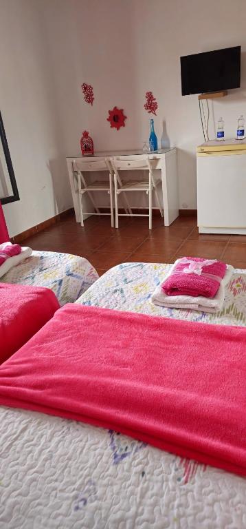 Postel nebo postele na pokoji v ubytování Numero28,Casa Tilama