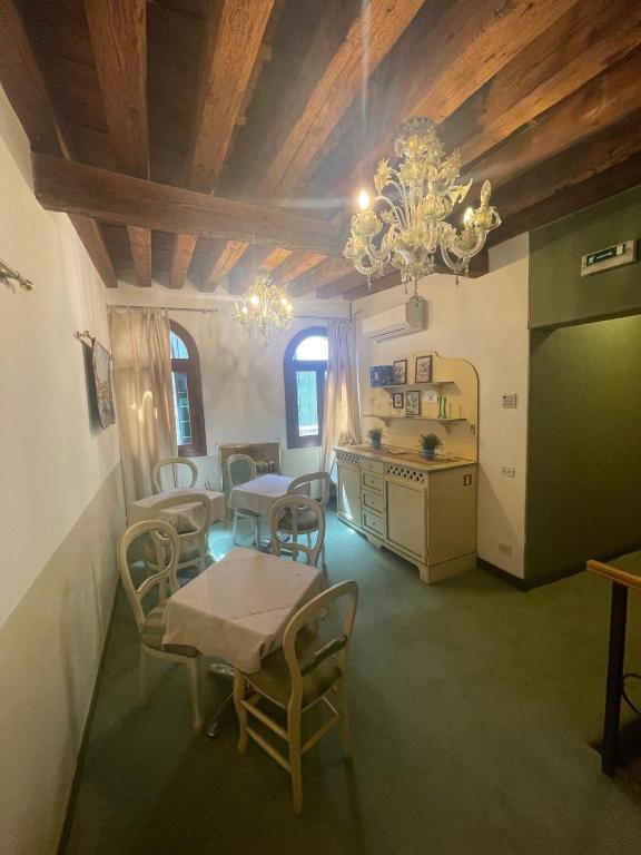 Kuchyň nebo kuchyňský kout v ubytování Locanda Ruga Rialto