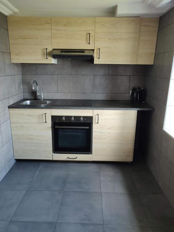 Kuchyň nebo kuchyňský kout v ubytování Hotel Eikenhof